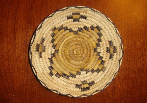 woven basket with brown and beige design