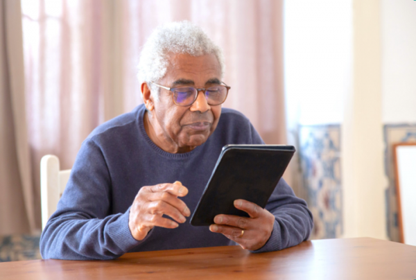 older gentleman using a tablet