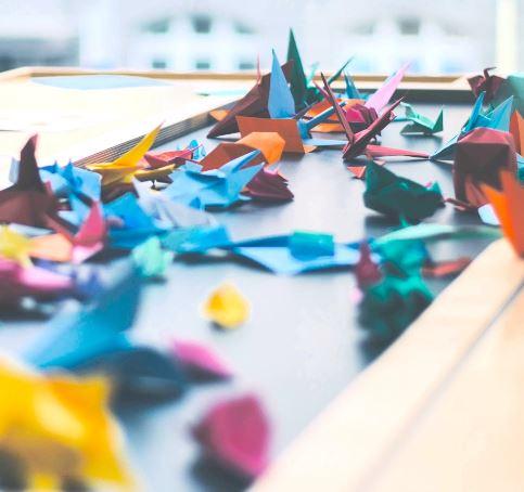 Origami cranes on a table