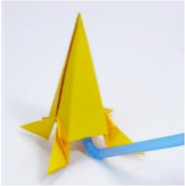 A yellow origami rocket