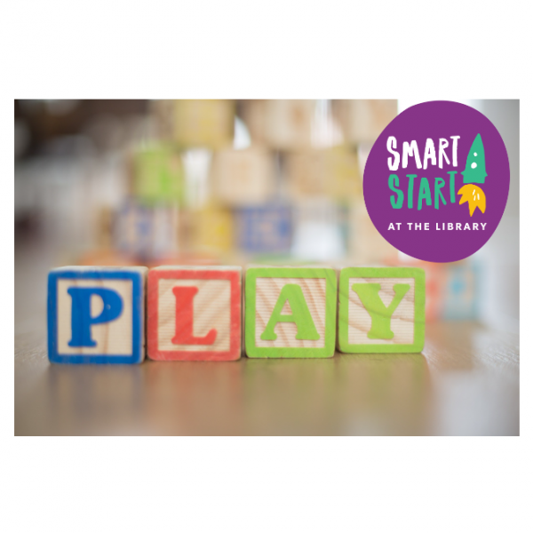 Photo of blocks with letters on them that spell the word "play".