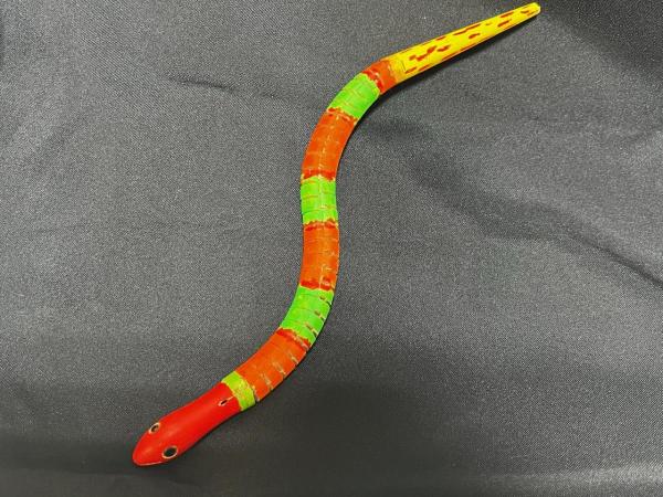 Painted wooden snake.