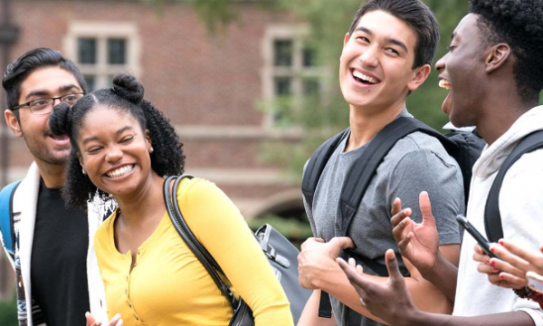 Image of teens talking and laughing together.