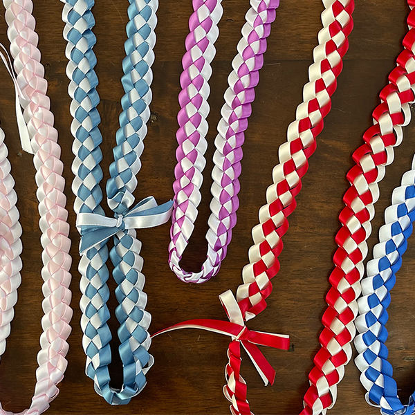 multiple ribbon lei on table