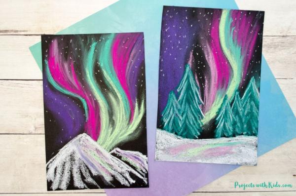 pastels in various colors on black paper depicting the Northern Lights