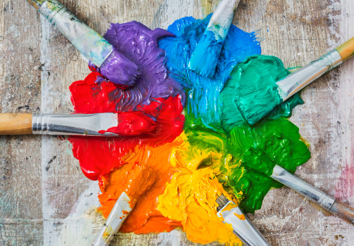 Paint brushes with colored paint 