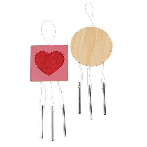 Two wind chimes, one is plain wood and the other is painted with a red heart